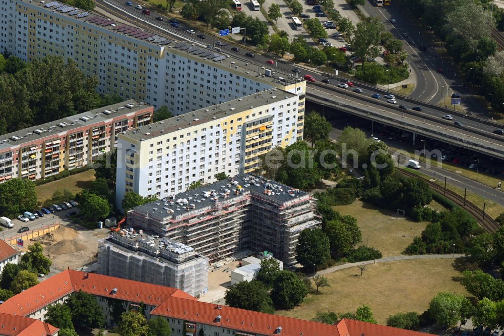 Berlin from the bird's eye view: Construction site for the multi-family residential building on Vesaliusstrasse in the district Pankow in Berlin, Germany