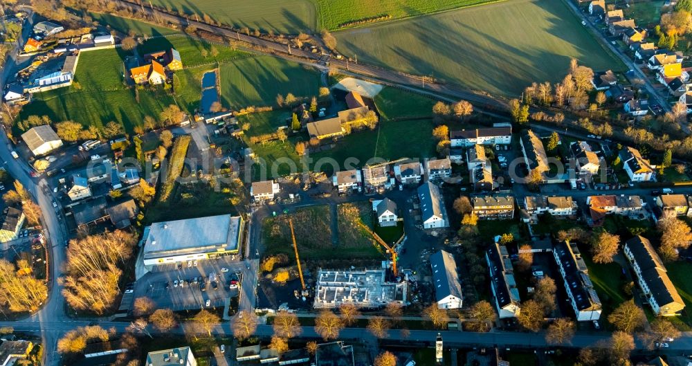 Hamm from the bird's eye view: Construction site for the multi-family residential building on Weetfelder Strasse in the district Selmigerheide in Hamm in the state North Rhine-Westphalia, Germany