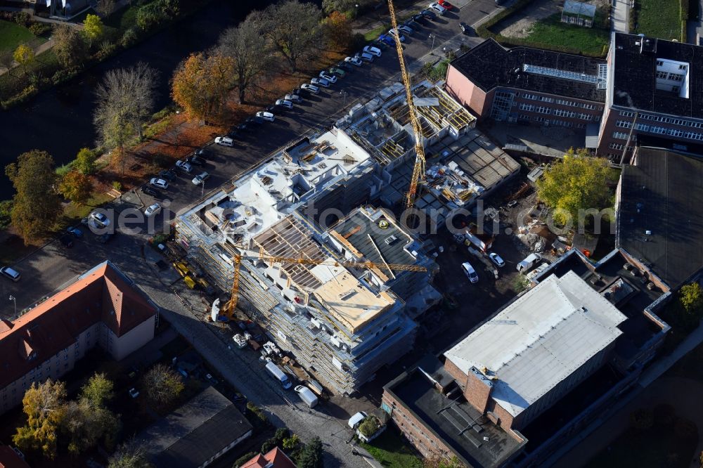 Brandenburg an der Havel from above - Construction site for the multi-family residential building of Wohnen am Stadtbad Brandenburg an der Havel GmbH at Kanalstrasse in Brandenburg an der Havel in the state Brandenburg, Germany