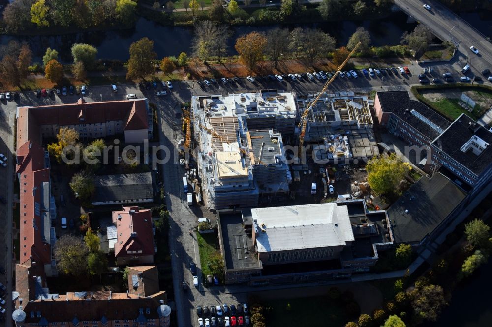 Brandenburg an der Havel from the bird's eye view: Construction site for the multi-family residential building of Wohnen am Stadtbad Brandenburg an der Havel GmbH at Kanalstrasse in Brandenburg an der Havel in the state Brandenburg, Germany