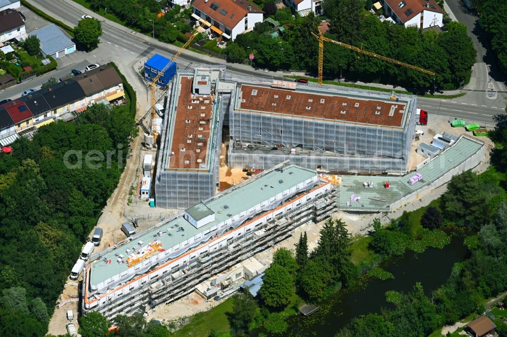 Olching from the bird's eye view: Construction site for the multi-family residential building WohnGUT Olching in Olching in the state Bavaria, Germany