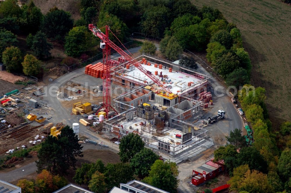 Aerial photograph Würzburg - Construction site for the new construction of a dorm residential care home - building for the physically handicapped Jakob Riedinger Haus in the district Heuchelhof in Wuerzburg in the state Bavaria, Germany