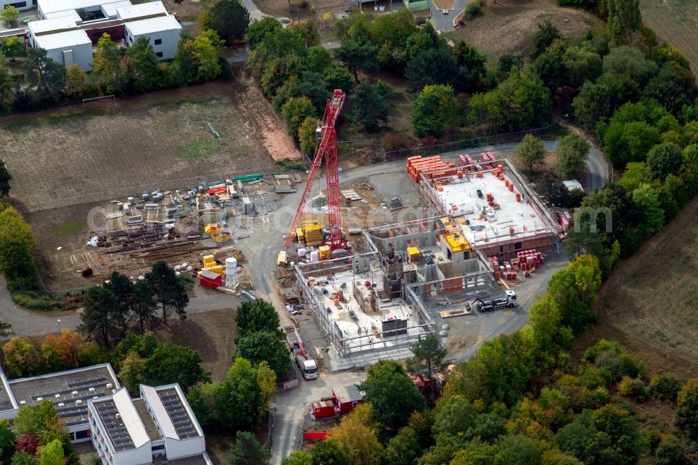 Würzburg from above - Construction site for the new construction of a dorm residential care home - building for the physically handicapped Jakob Riedinger Haus in the district Heuchelhof in Wuerzburg in the state Bavaria, Germany