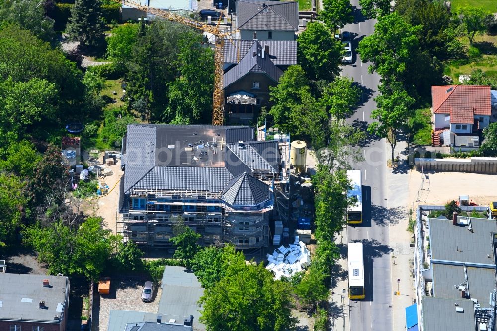 Aerial photograph Berlin - Construction site for the new construction of a dorm residential care home - building for the physically handicapped on Wodanstrasse in the district Mahlsdorf in Berlin, Germany