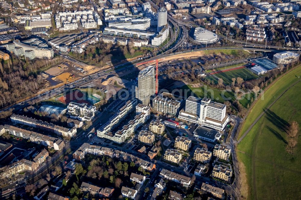 Düsseldorf from the bird's eye view: Construction site for the new construction of the high-rise residential building Rheinkilometer 740 (RKM 740) on Am Heerdter Krankenhaus in Duesseldorf in the state North Rhine-Westphalia, Germany