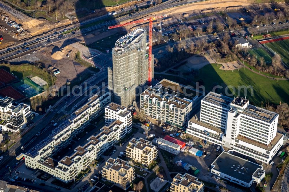 Aerial image Düsseldorf - Construction site for the new construction of the high-rise residential building Rheinkilometer 740 (RKM 740) on Am Heerdter Krankenhaus in Duesseldorf in the state North Rhine-Westphalia, Germany