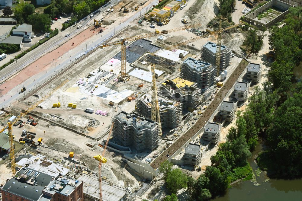 Halle (Saale) from the bird's eye view: Construction site for the new construction of residential houses of the project Family houses on Boellberger Weg in Halle (Saale) in the state Saxony-Anhalt, Germany