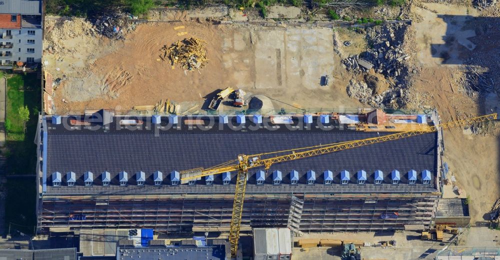 Aerial photograph Berlin - Construction of the new building project Wohnneubau- Carrée Alte Post in Dottistrasse - Ruschestrasse in Berlin Lichtenberg in Germany