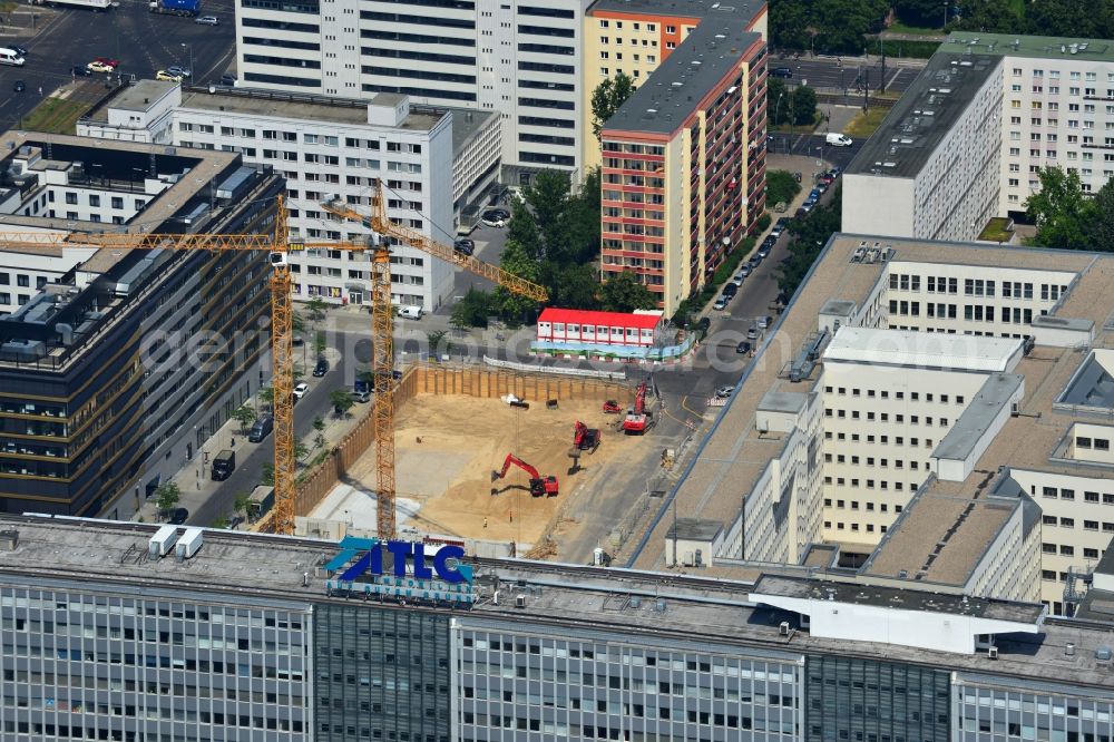 Berlin Prenzlauer Berg from the bird's eye view: Construction site for the new construction of residential district at Alexanderplatz in Berlin