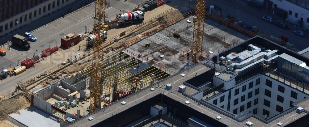 Berlin Prenzlauer Berg from the bird's eye view: Construction site for the new construction of residential district at Alexanderplatz in Berlin