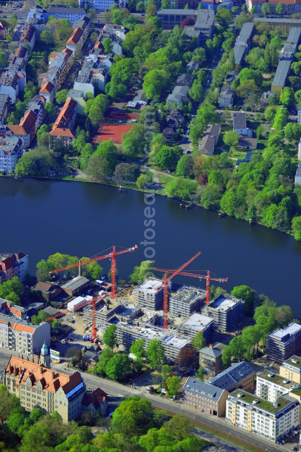 Aerial image Berlin - Construction site for new residential construction of RESIDENTIAL QUARTER UFERKRONE at the riverside at Linden Street in Berlin Koepenick