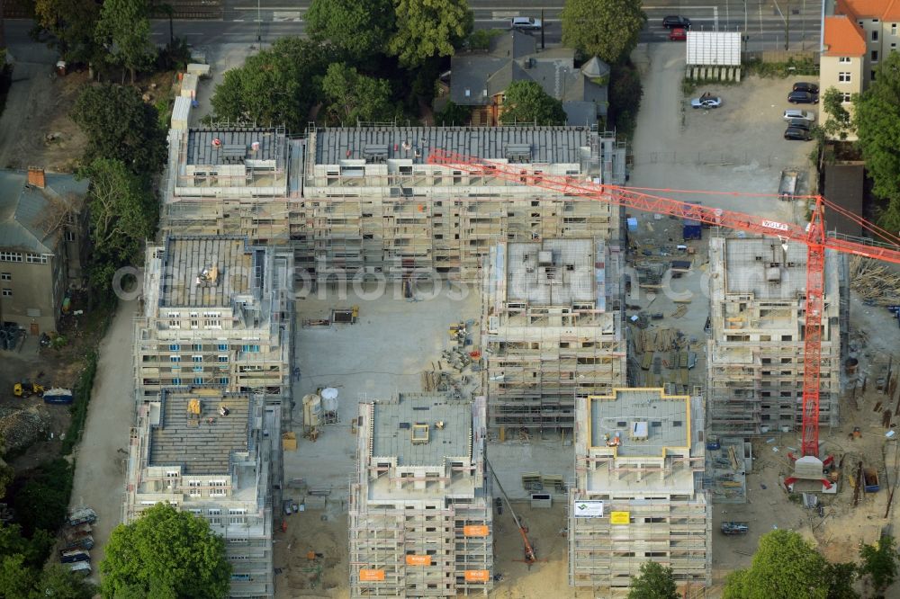 Aerial image Berlin - Construction site for new residential construction of RESIDENTIAL QUARTER UFERKRONE at the riverside at Linden Street in Berlin Koepenick