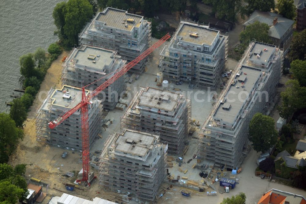 Aerial photograph Berlin - Construction site for new residential construction of RESIDENTIAL QUARTER UFERKRONE at the riverside at Linden Street in Berlin Koepenick