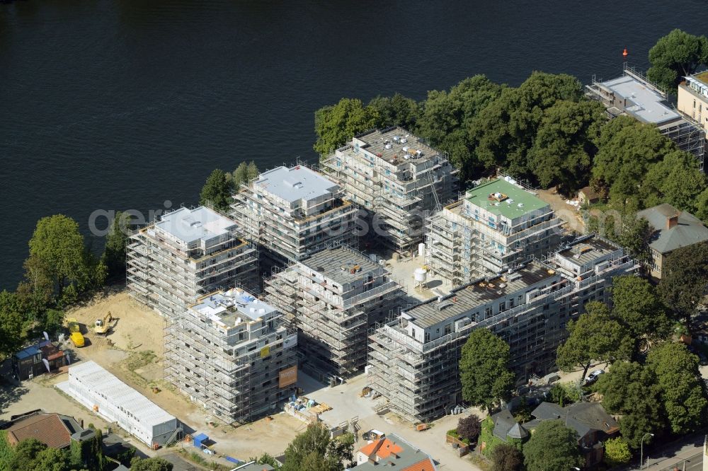 Aerial image Berlin - Construction site for new residential construction of RESIDENTIAL QUARTER UFERKRONE at the riverside at Linden Street in Berlin Koepenick