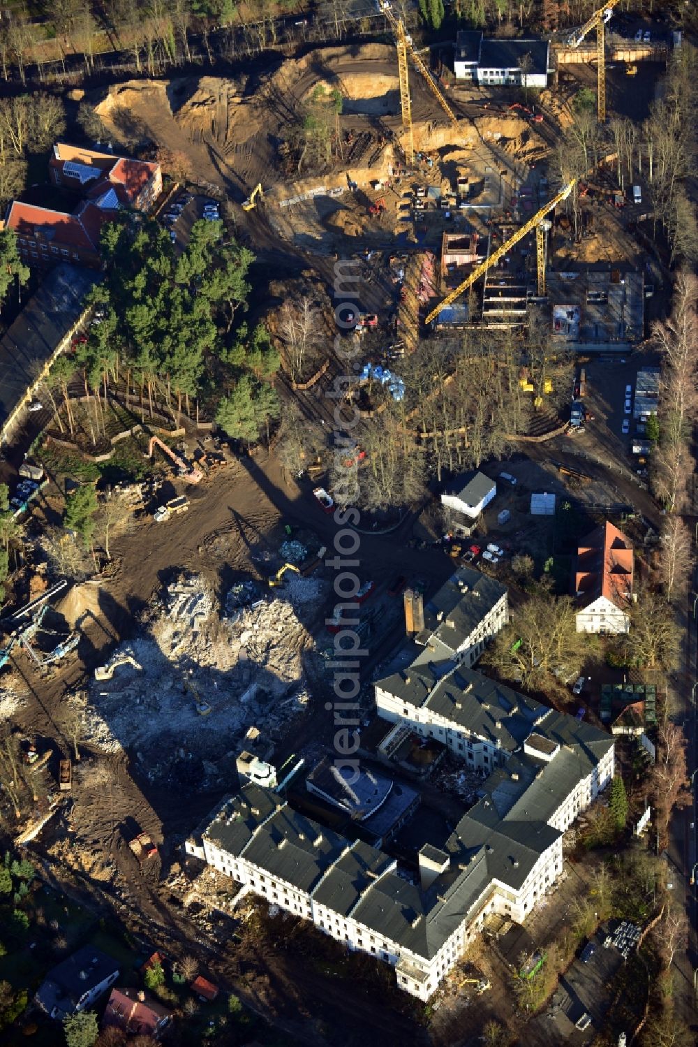 Berlin OT Dahlem from above - Construction site for a residential area in Clayallee in the district of Steglitz-Zehlendorf in Berlin. The project is located on site of the former orthopedics clinic and home. The project is run by OHA Projektentwicklungsgesellschaft