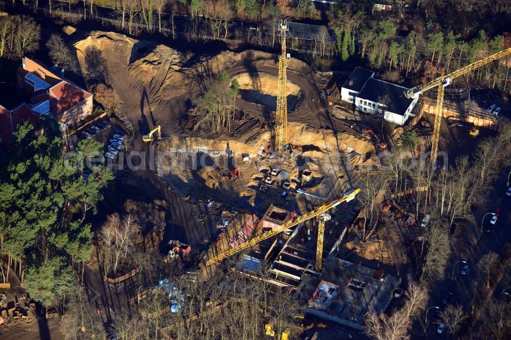 Berlin OT Dahlem from the bird's eye view: Construction site for a residential area in Clayallee in the district of Steglitz-Zehlendorf in Berlin. The project is located on site of the former orthopedics clinic and home. The project is run by OHA Projektentwicklungsgesellschaft