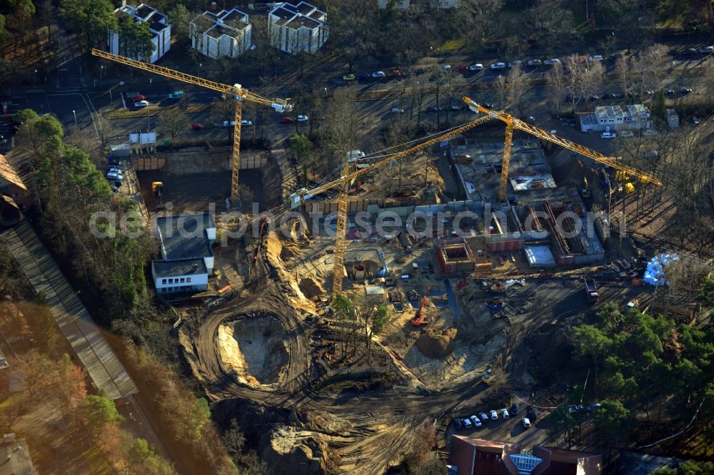 Berlin OT Dahlem from above - Construction site for a residential area in Clayallee in the district of Steglitz-Zehlendorf in Berlin. The project is located on site of the former orthopedics clinic and home. The project is run by OHA Projektentwicklungsgesellschaft