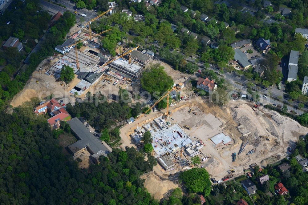 Berlin OT Dahlem from above - Construction site for a residential area in Clayallee in the district of Steglitz-Zehlendorf in Berlin. The project is located on site of the former orthopedics clinic and home. The project is run by OHA Projektentwicklungsgesellschaft