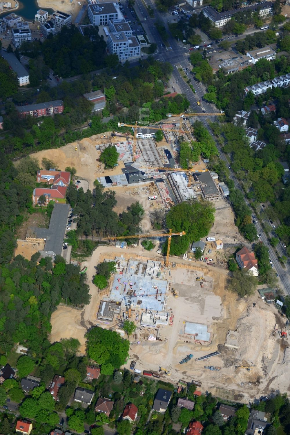 Berlin OT Dahlem from the bird's eye view: Construction site for a residential area in Clayallee in the district of Steglitz-Zehlendorf in Berlin. The project is located on site of the former orthopedics clinic and home. The project is run by OHA Projektentwicklungsgesellschaft