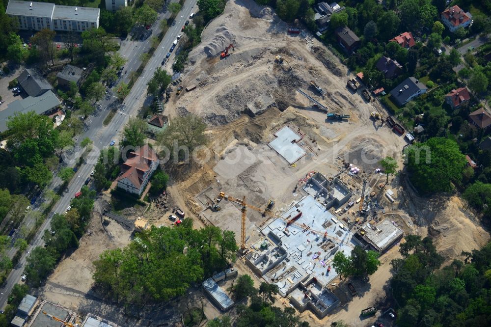 Berlin OT Dahlem from the bird's eye view: Construction site for a residential area in Clayallee in the district of Steglitz-Zehlendorf in Berlin. The project is located on site of the former orthopedics clinic and home. The project is run by OHA Projektentwicklungsgesellschaft