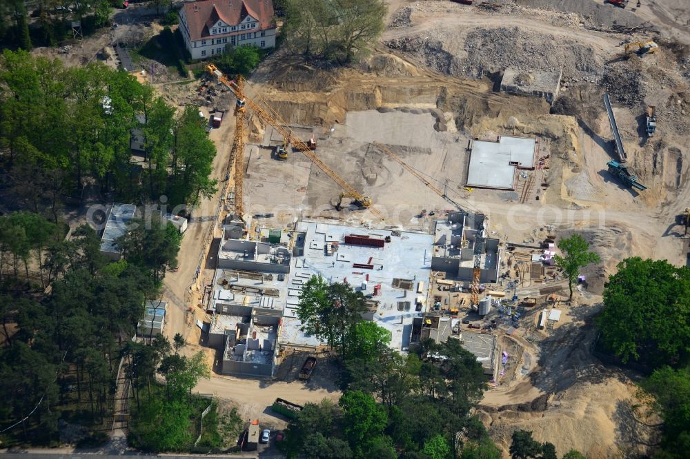 Berlin OT Dahlem from above - Construction site for a residential area in Clayallee in the district of Steglitz-Zehlendorf in Berlin. The project is located on site of the former orthopedics clinic and home. The project is run by OHA Projektentwicklungsgesellschaft