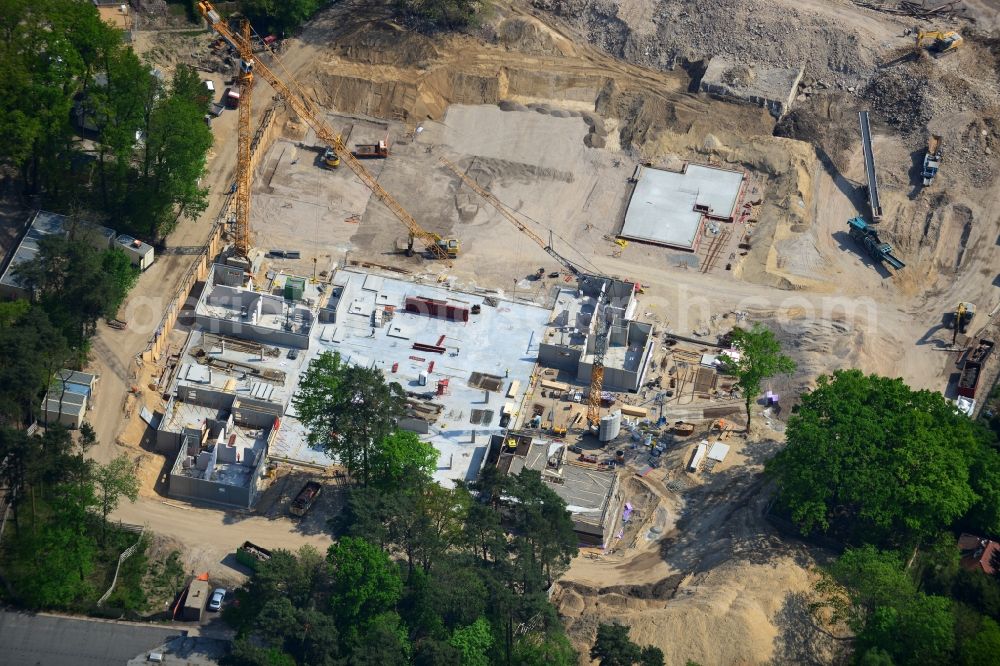 Berlin OT Dahlem from the bird's eye view: Construction site for a residential area in Clayallee in the district of Steglitz-Zehlendorf in Berlin. The project is located on site of the former orthopedics clinic and home. The project is run by OHA Projektentwicklungsgesellschaft