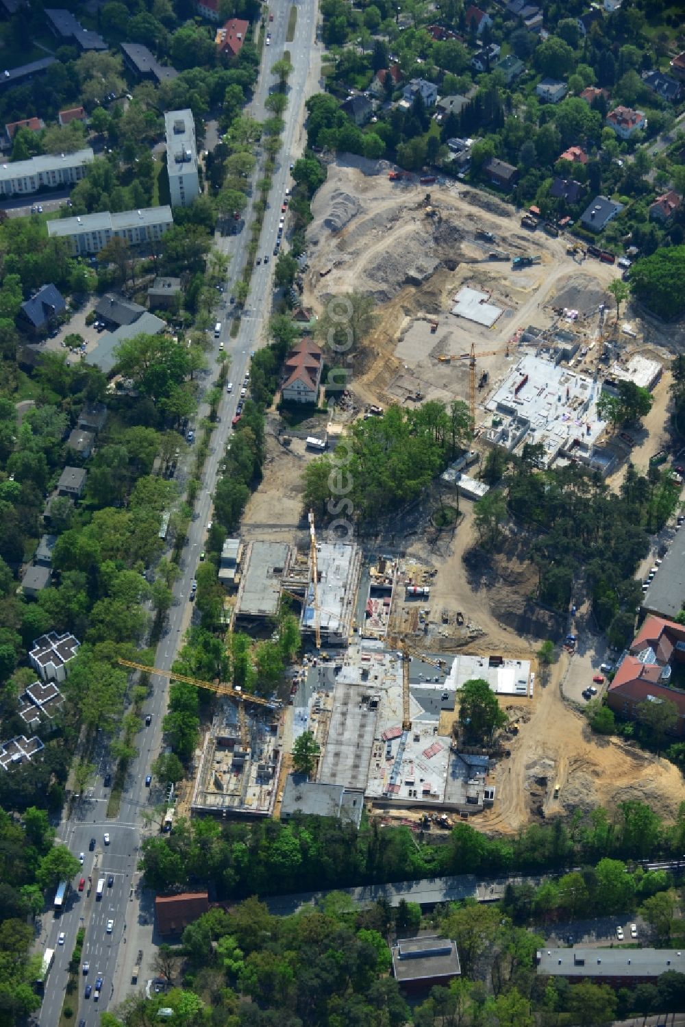 Berlin OT Dahlem from the bird's eye view: Construction site for a residential area in Clayallee in the district of Steglitz-Zehlendorf in Berlin. The project is located on site of the former orthopedics clinic and home. The project is run by OHA Projektentwicklungsgesellschaft