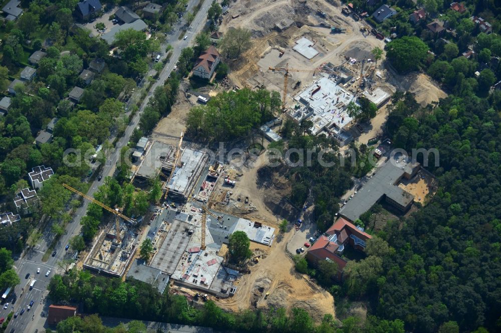 Aerial image Berlin OT Dahlem - Construction site for a residential area in Clayallee in the district of Steglitz-Zehlendorf in Berlin. The project is located on site of the former orthopedics clinic and home. The project is run by OHA Projektentwicklungsgesellschaft