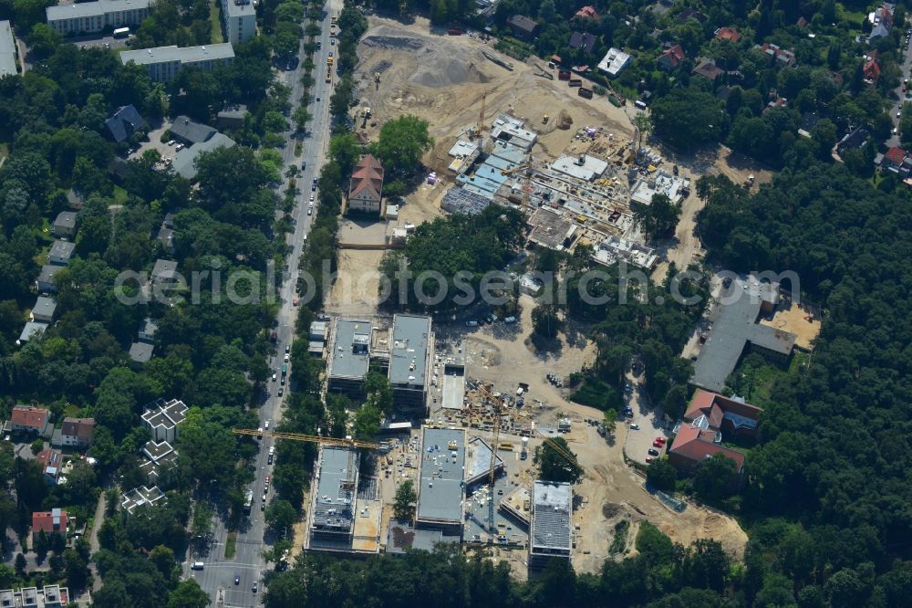 Berlin OT Dahlem from the bird's eye view: Construction site for a residential area in Clayallee in the district of Steglitz-Zehlendorf in Berlin. The project is located on site of the former orthopedics clinic and home. The project is run by OHA Projektentwicklungsgesellschaft