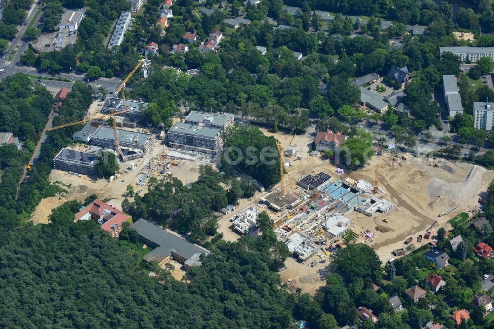 Aerial image Berlin OT Dahlem - Construction site for a residential area in Clayallee in the district of Steglitz-Zehlendorf in Berlin. The project is located on site of the former orthopedics clinic and home. The project is run by OHA Projektentwicklungsgesellschaft