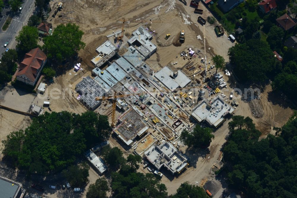 Aerial image Berlin OT Dahlem - Construction site for a residential area in Clayallee in the district of Steglitz-Zehlendorf in Berlin. The project is located on site of the former orthopedics clinic and home. The project is run by OHA Projektentwicklungsgesellschaft