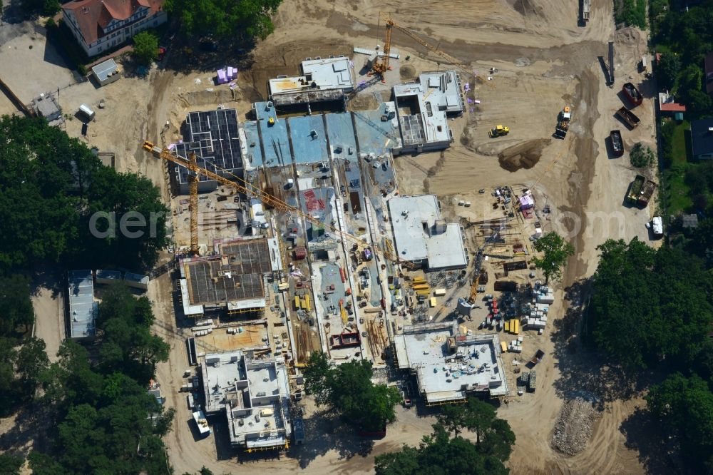 Berlin OT Dahlem from above - Construction site for a residential area in Clayallee in the district of Steglitz-Zehlendorf in Berlin. The project is located on site of the former orthopedics clinic and home. The project is run by OHA Projektentwicklungsgesellschaft