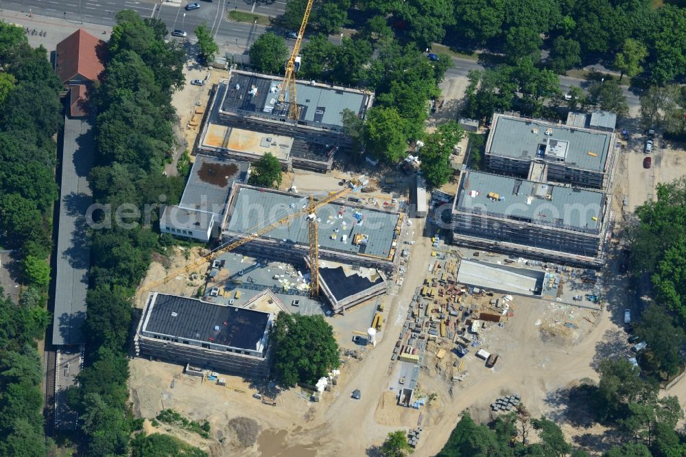 Aerial image Berlin OT Dahlem - Construction site for a residential area in Clayallee in the district of Steglitz-Zehlendorf in Berlin. The project is located on site of the former orthopedics clinic and home. The project is run by OHA Projektentwicklungsgesellschaft