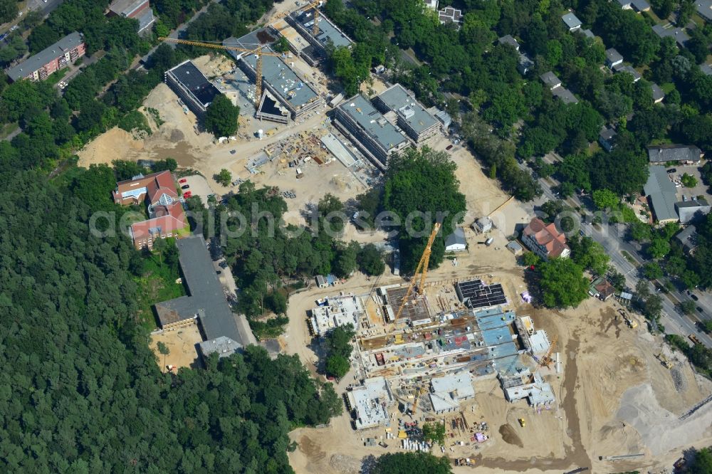 Berlin OT Dahlem from above - Construction site for a residential area in Clayallee in the district of Steglitz-Zehlendorf in Berlin. The project is located on site of the former orthopedics clinic and home. The project is run by OHA Projektentwicklungsgesellschaft