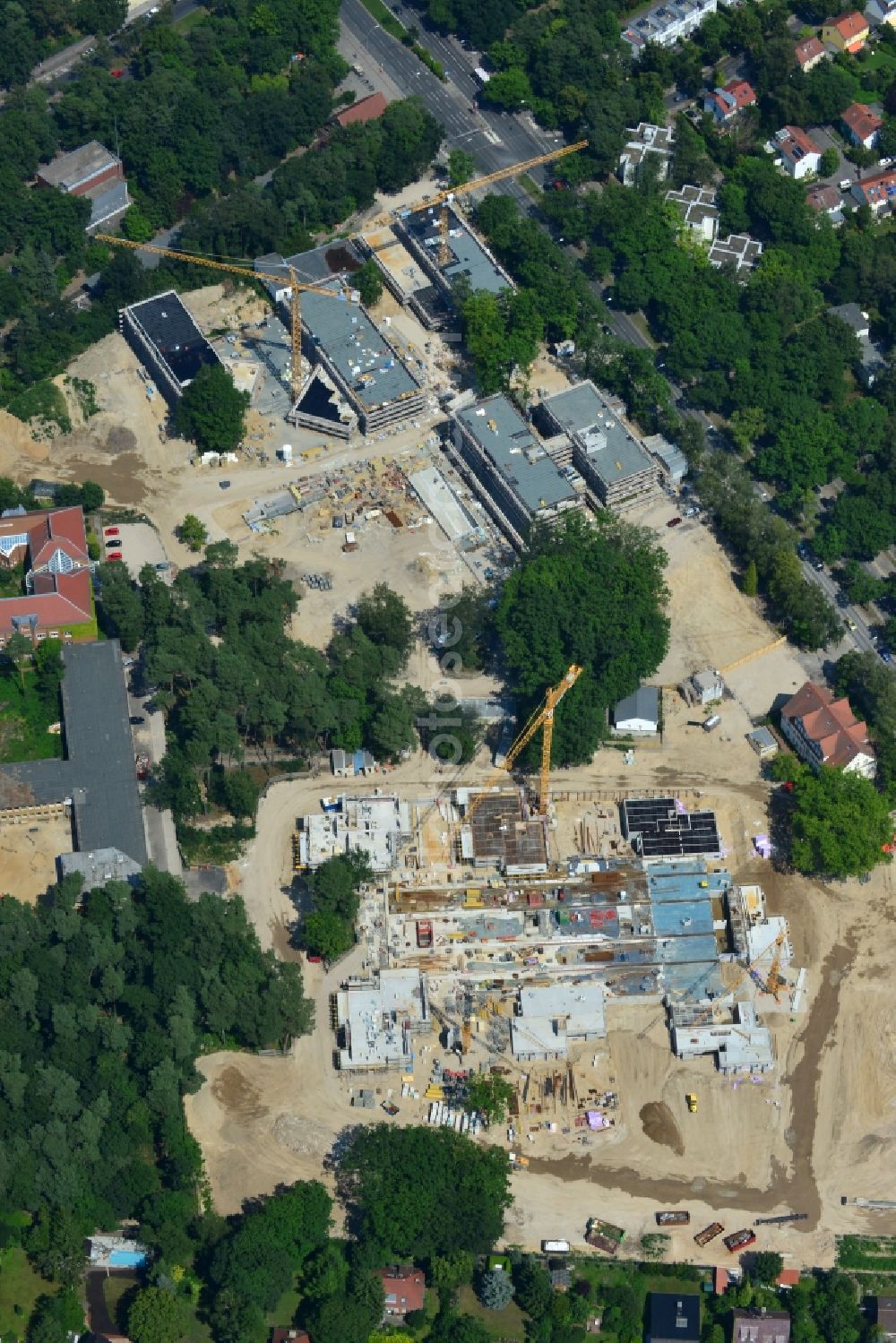 Berlin OT Dahlem from the bird's eye view: Construction site for a residential area in Clayallee in the district of Steglitz-Zehlendorf in Berlin. The project is located on site of the former orthopedics clinic and home. The project is run by OHA Projektentwicklungsgesellschaft