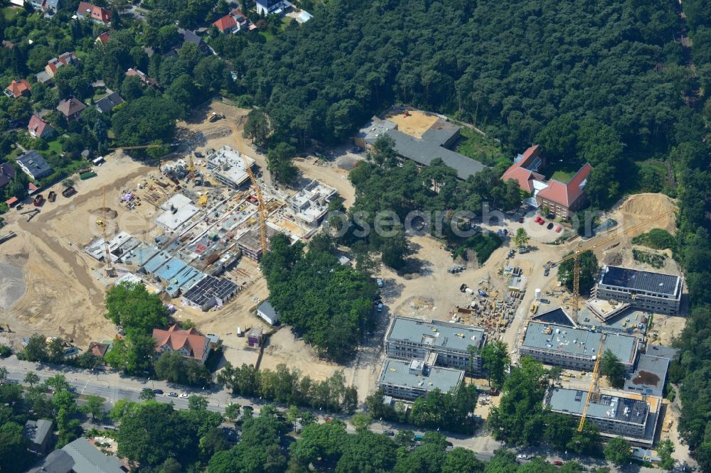 Berlin OT Dahlem from above - Construction site for a residential area in Clayallee in the district of Steglitz-Zehlendorf in Berlin. The project is located on site of the former orthopedics clinic and home. The project is run by OHA Projektentwicklungsgesellschaft