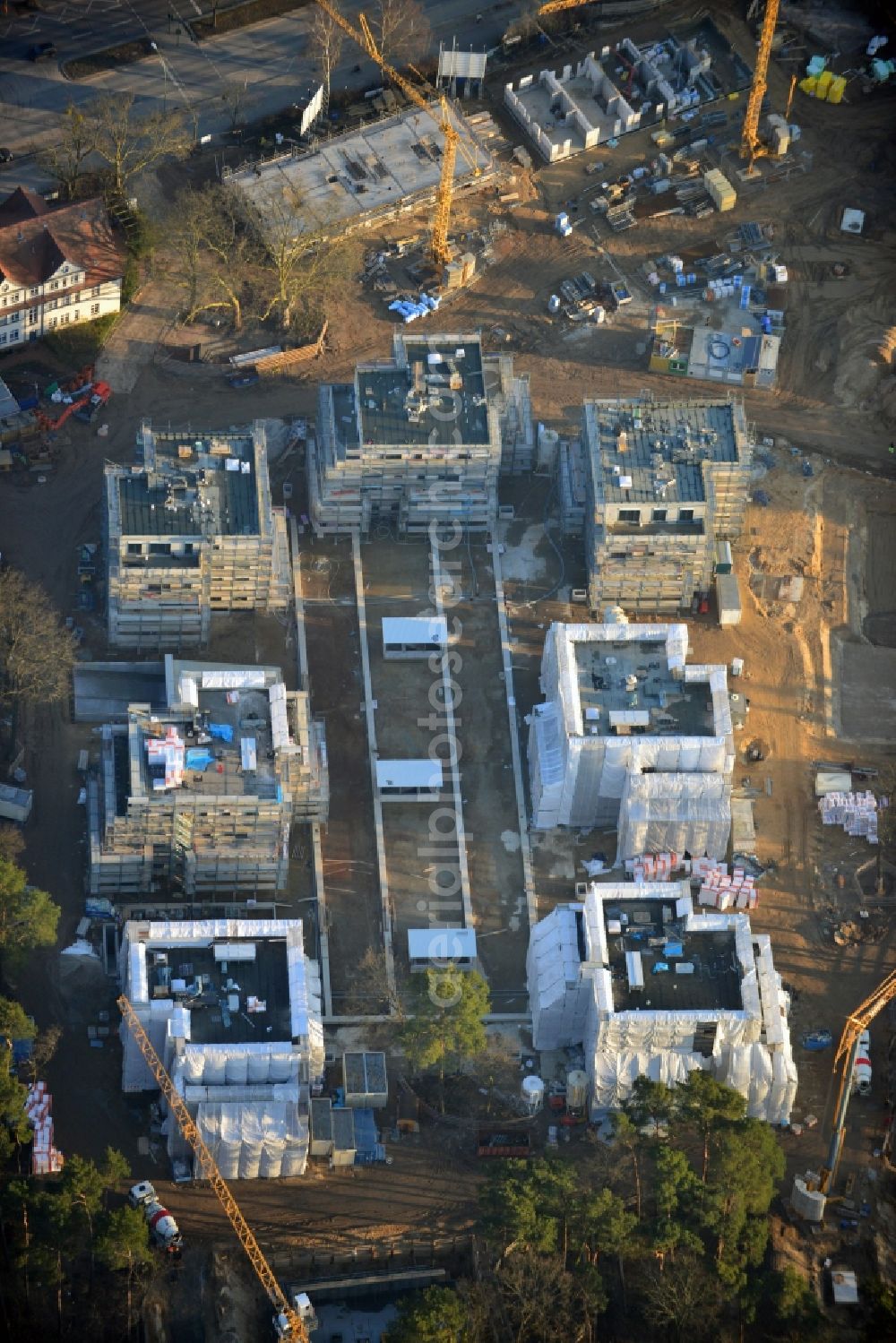 Berlin , Dahlem from the bird's eye view: Construction site for a residential area in Clayallee in the district of Steglitz-Zehlendorf in Berlin. The project is located on site of the former orthopedics clinic and home. The project is run by OHA Projektentwicklungsgesellschaft