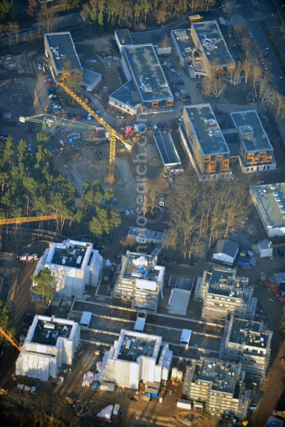 Aerial photograph Berlin , Dahlem - Construction site for a residential area in Clayallee in the district of Steglitz-Zehlendorf in Berlin. The project is located on site of the former orthopedics clinic and home. The project is run by OHA Projektentwicklungsgesellschaft