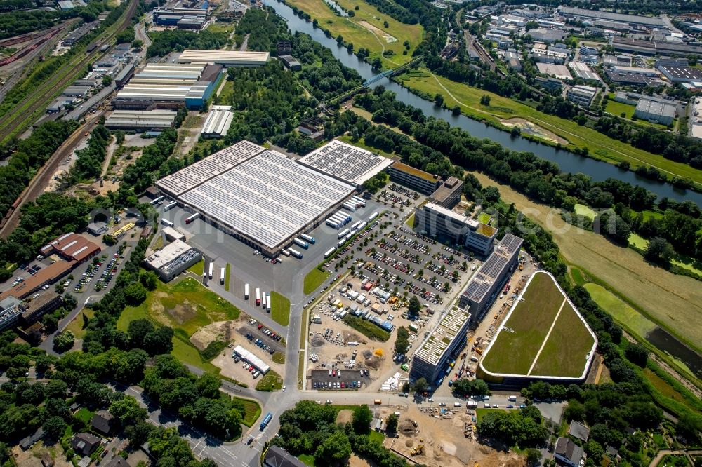 Mülheim an der Ruhr from the bird's eye view: Construction site for the extension building of the administrative offices of Aldi-Sued on Burgstrasse in the Styrum part of Muelheim on the Ruhr in the state of North Rhine-Westphalia