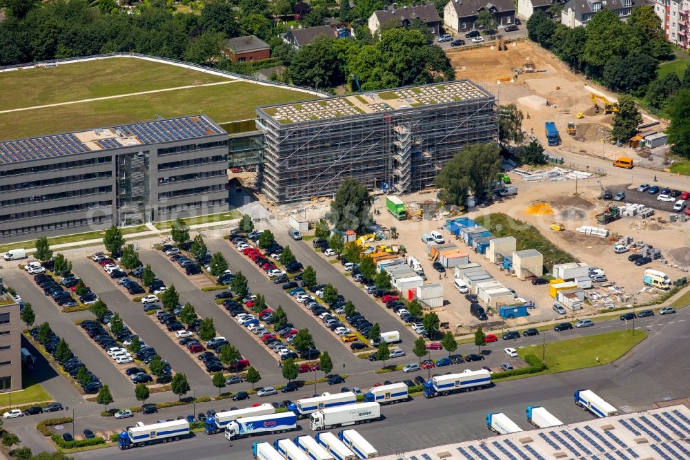 Mülheim an der Ruhr from above - Construction site for the extension building of the administrative offices of Aldi-Sued on Burgstrasse in the Styrum part of Muelheim on the Ruhr in the state of North Rhine-Westphalia