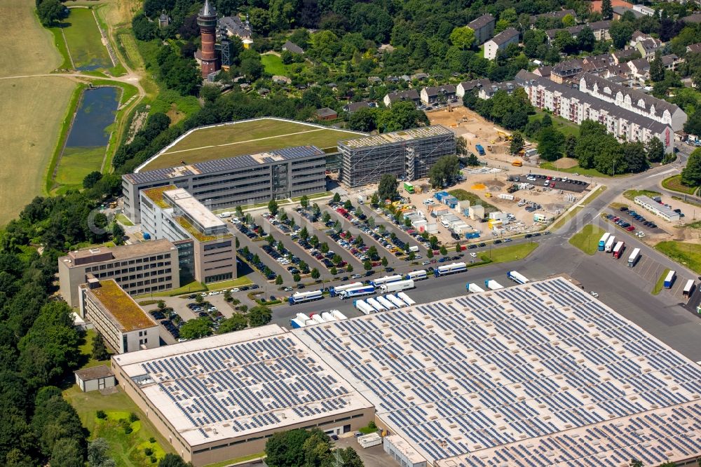 Mülheim an der Ruhr from the bird's eye view: Construction site for the extension building of the administrative offices of Aldi-Sued on Burgstrasse in the Styrum part of Muelheim on the Ruhr in the state of North Rhine-Westphalia