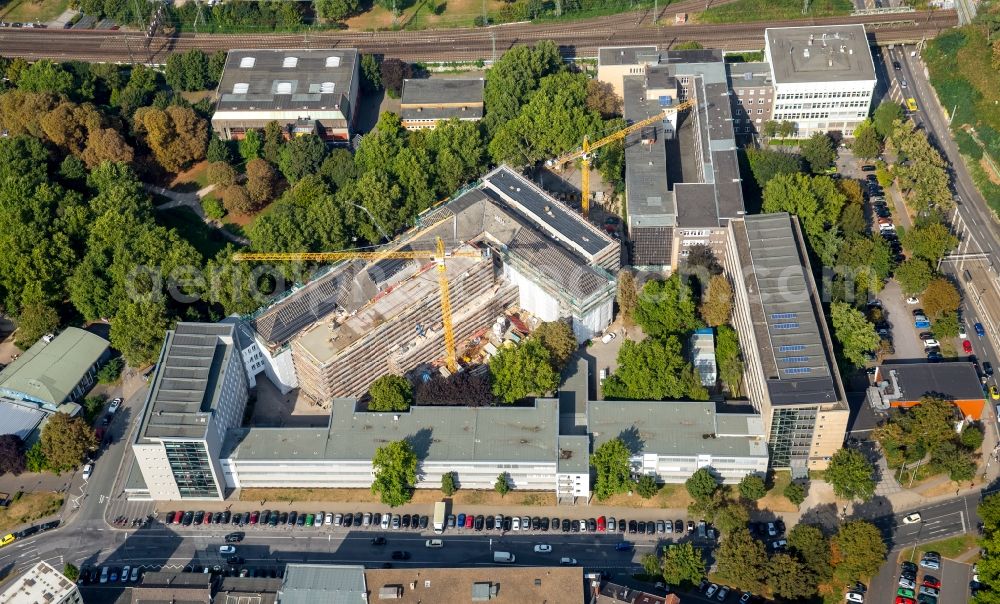 Dortmund from the bird's eye view: Construction for the reconstruction of the extensions from the 1950s and 1960s at the Fritz-Henssler-Berufskolleg in Dortmund in the state North Rhine-Westphalia