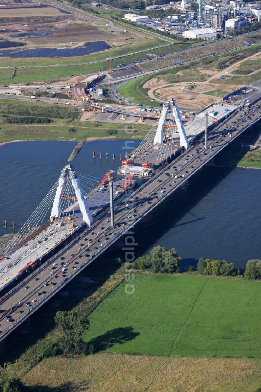 Leverkusen from above - Construction site for the renovation, renewal and repair of the motorway bridge structure of the BAB A1 Leverkusen Rhine Bridge in Leverkusen in the federal state of North Rhine-Westphalia, Germany. Further information from: Autobahn GmbH des Bundes Westfalen Zweigniederlassung, HOCHTIEF Aktiengesellschaft AG, Landesbetrieb Strassenbau Nordrhein-Westfalen, PORR Deutschland GmbH, SEH Engineering GmbH