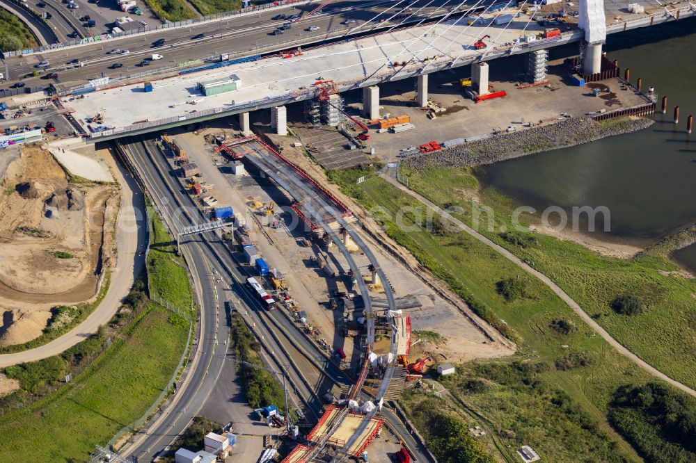 Aerial photograph Leverkusen - Construction site for the renovation, renewal and repair of the motorway bridge structure of the BAB A1 Leverkusen Rhine Bridge in Leverkusen in the federal state of North Rhine-Westphalia, Germany. Further information from: Autobahn GmbH des Bundes Westfalen Zweigniederlassung, HOCHTIEF Aktiengesellschaft AG, Landesbetrieb Strassenbau Nordrhein-Westfalen, PORR Deutschland GmbH, SEH Engineering GmbH