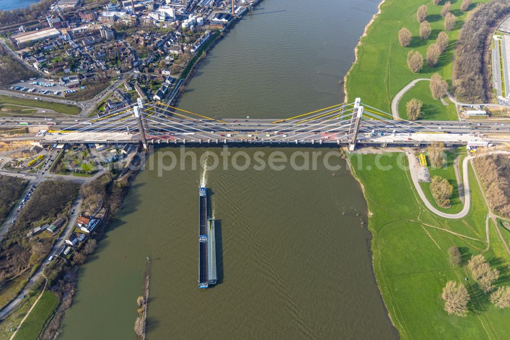 Aerial photograph Duisburg - Construction site for the rehabilitation and repair of the motorway bridge construction Rheinbruecke Duisburg-Neuenkamp on street Brueckenstrasse in the district Homberg in Duisburg at Ruhrgebiet in the state North Rhine-Westphalia, Germany