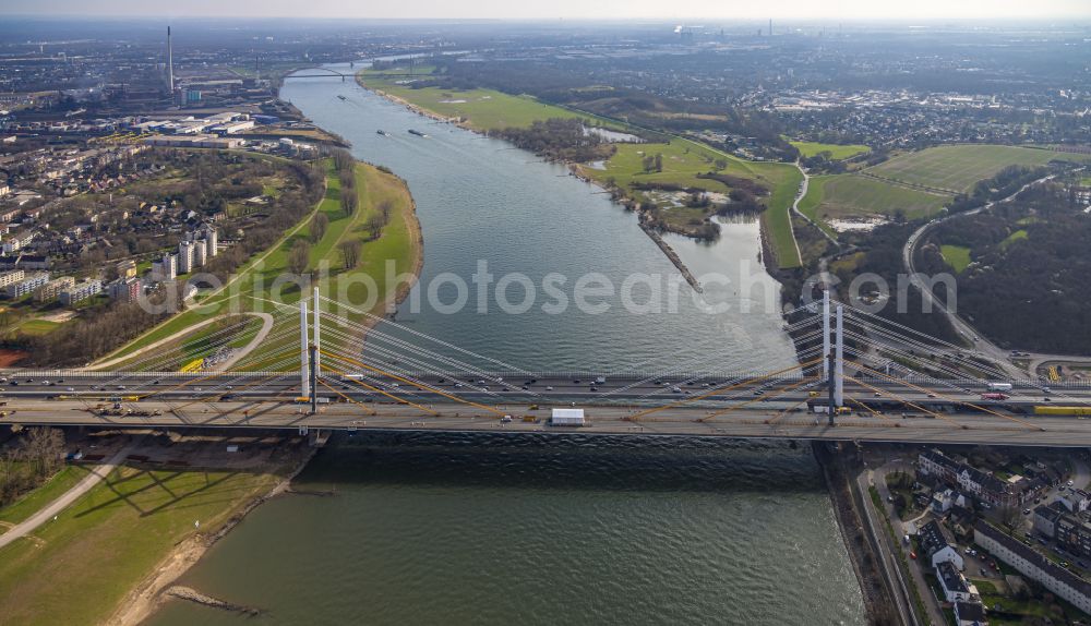 Aerial photograph Duisburg - Construction site for the rehabilitation and repair of the motorway bridge construction Rheinbruecke Duisburg-Neuenkamp on street Brueckenstrasse in the district Homberg in Duisburg at Ruhrgebiet in the state North Rhine-Westphalia, Germany