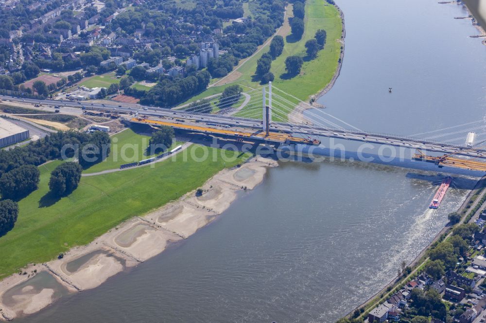 Aerial image Homberg - Construction site for the renovation, renewal, repair and dismantling of the motorway bridge structure BAB A40 Rheinbruecke Duisburg-Neuenkamp on Brueckenstrasse in the district of Homberg in Duisburg in the Ruhr area in the federal state of North Rhine-Westphalia, Germany