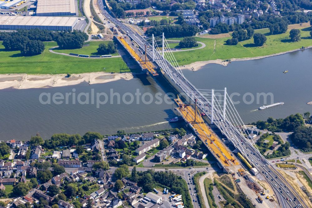 Homberg from above - Construction site for the renovation, renewal, repair and dismantling of the motorway bridge structure BAB A40 Rheinbruecke Duisburg-Neuenkamp on Brueckenstrasse in the district of Homberg in Duisburg in the Ruhr area in the federal state of North Rhine-Westphalia, Germany