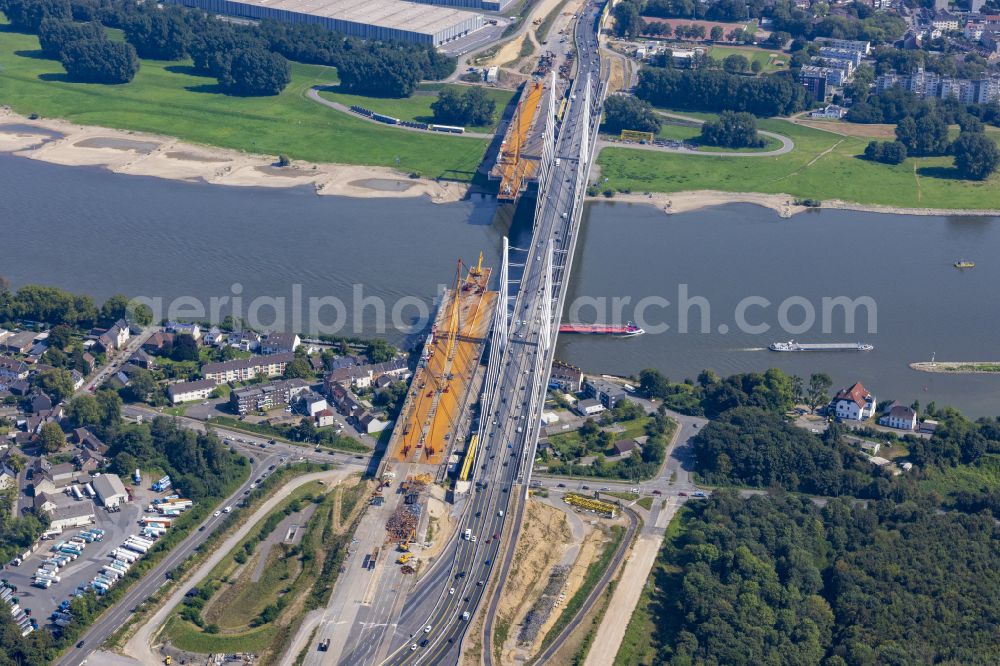 Aerial image Homberg - Construction site for the renovation, renewal, repair and dismantling of the motorway bridge structure BAB A40 Rheinbruecke Duisburg-Neuenkamp on Brueckenstrasse in the district of Homberg in Duisburg in the Ruhr area in the federal state of North Rhine-Westphalia, Germany