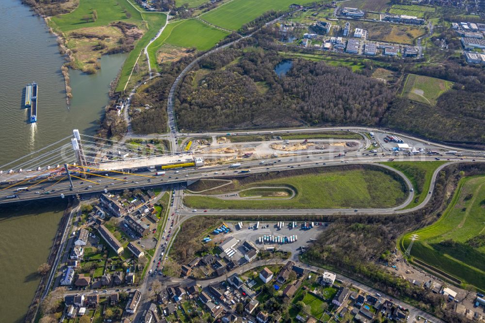 Duisburg from the bird's eye view: Construction site for the rehabilitation and repair of the motorway bridge construction Rheinbruecke Duisburg-Neuenkamp in the district Homberg in Duisburg at Ruhrgebiet in the state North Rhine-Westphalia, Germany